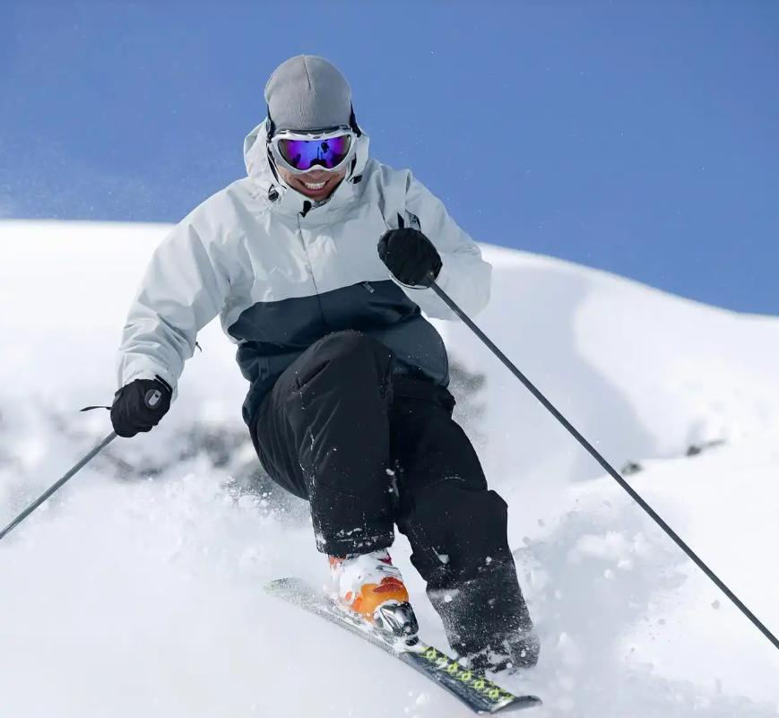 Why is it necessary to wear goggles when skiing?